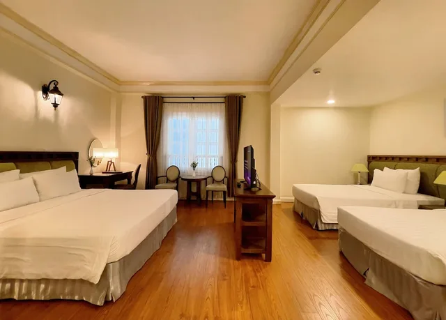 غرفة سوبيريور رباعية بسرير كوين وسريرين منفصلين، Phoenix Hotel Vung Tau 7/10