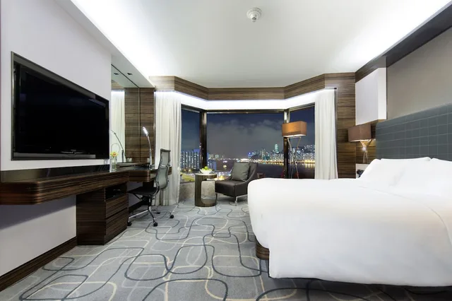 جناح بسرير كينج بإطلالة على المرفأ مع دخول صالة النادي، New World Millennium Hong Kong 4/6