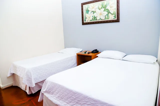 غرفة اقتصادية ثلاثية بسرير مزدوج وسرير فردي، VOA Hotel Rezende 1/7