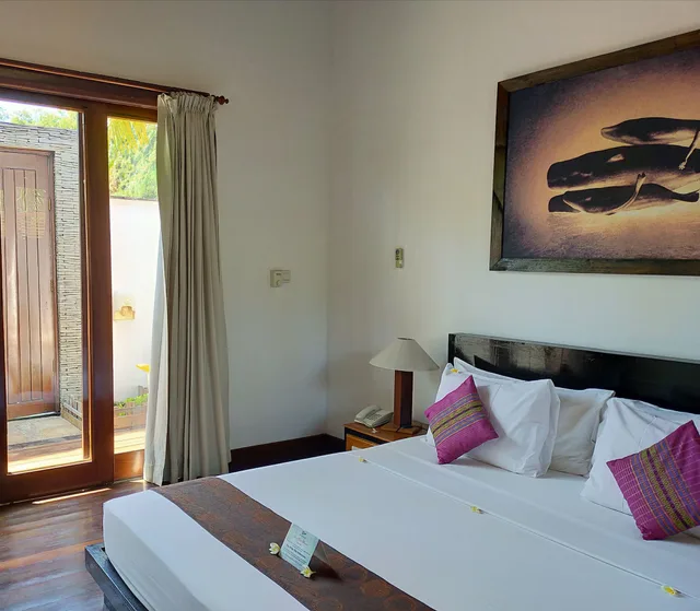 غرفة قياسية بسرير كينج بشرفة، The Trawangan Resort 1/10