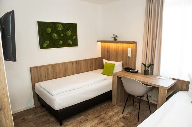 غرفة بسريرين منفصلين، GOLDEN LEAF PERLACH ALLEE HOF 5/10