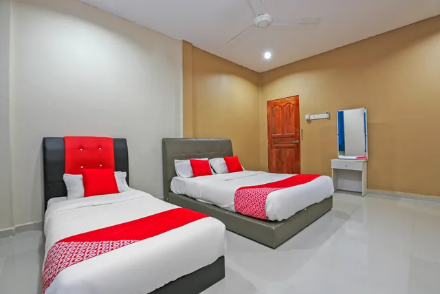 جناح ثلاثي، OYO 89933 Nun Hotel 1/2