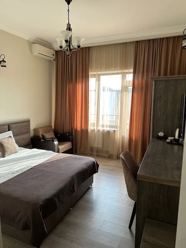 غرفة قياسية بسرير مزدوج أو سريرين منفصلين، Capital Hotel 3/4