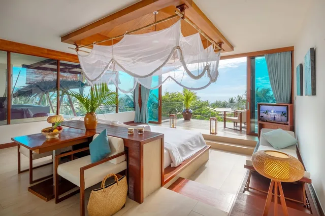 جناح بسرير كينج بإطلالة على البحر مع دخول الصالة، Fusion Resort Cam Ranh 2/2