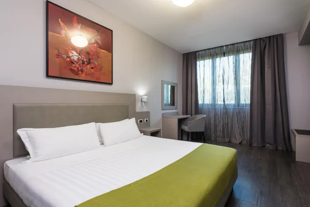 غرفة ديلوكس بسرير كوين، Noba Hotel e Residenze 2/4