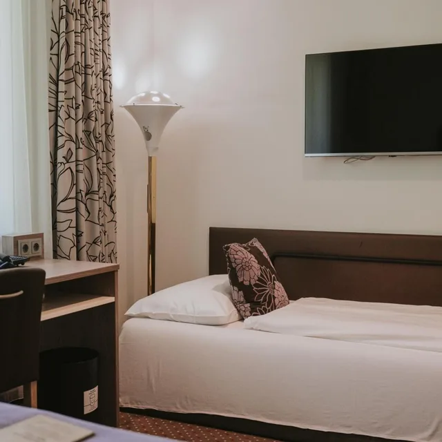 غرفة كومفورت ثلاثية بإطلالة على الحديقة، Boutiquehotel Stadthalle 1/10