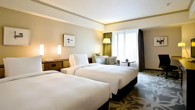 غرفة فاخرة بسرير نصف مزدوج وسريرين منفصلين، Hotel Nikko Fukuoka 1/1
