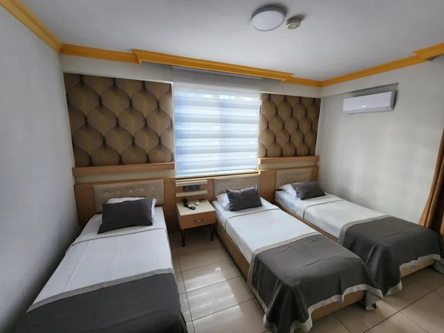 غرفة قياسية ثلاثية، Gunduz Otel 7/9