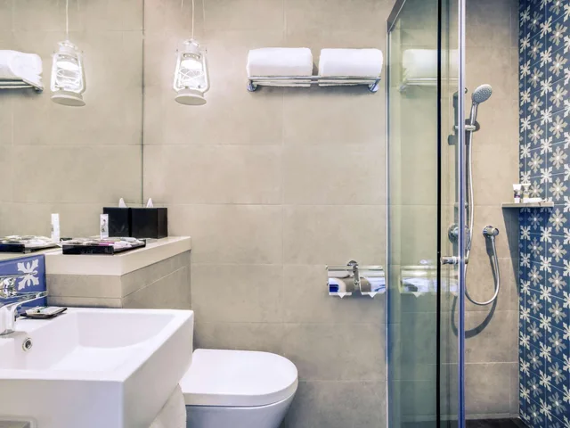 غرفة ديلوكس بسريرين منفصلين في طابق مرتفع، Mercure Singapore On Stevens 10/10