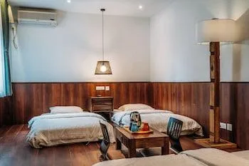 سكن مشترك مختلط رباعي بأربعة أسرّة، Chengdu Flipflop Hostel 1/1
