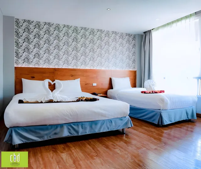 غرفة ثلاثية بسرير كينج وسرير فردي، Cbd Hotel Suratthani 3/3