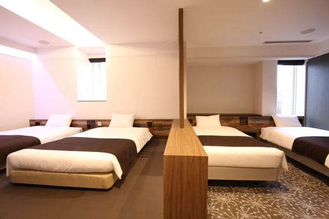 غرفة يابانية غربية عائلية بسرير مزدوج بحمام خاص بحوض استحمام، Quintessa Hotel Sapporo 3/8