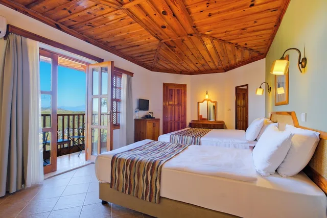 غرفة قياسية بسرير كوين، Montana Pine Resort Hotel and SPA 2/8