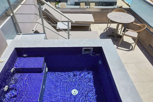 Junior Suite, King Bed, Outdoor Jetted Tub، Sea Breeze Santorini Beach Resort, Curio by Hilton 3/3