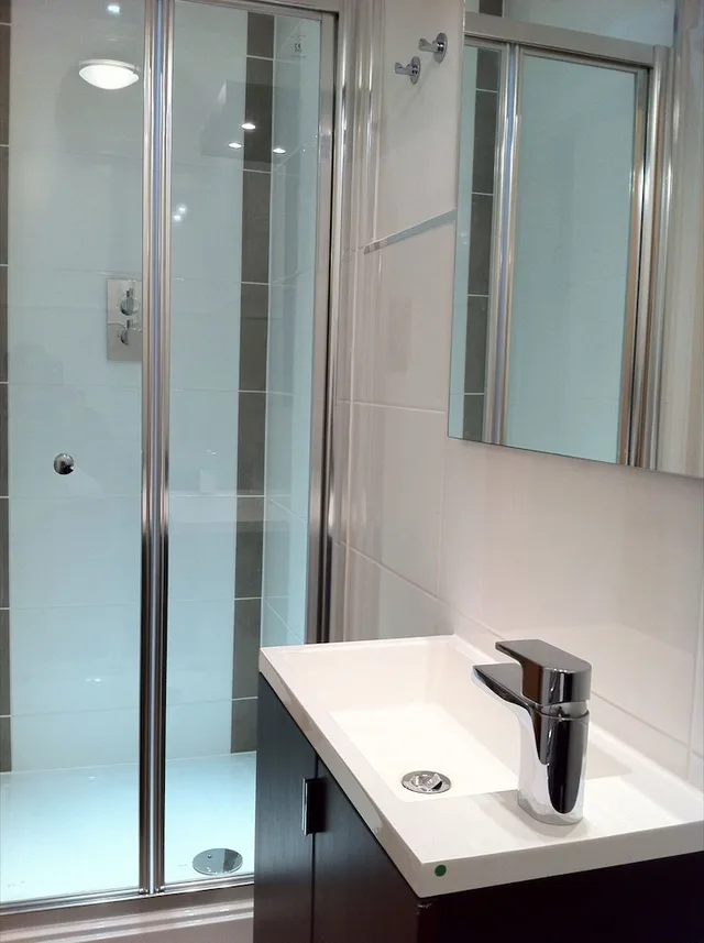 جناح بسرير كينج بغرفة نوم واحدة مع أريكة، Lyall Apartment Hotel 2/2