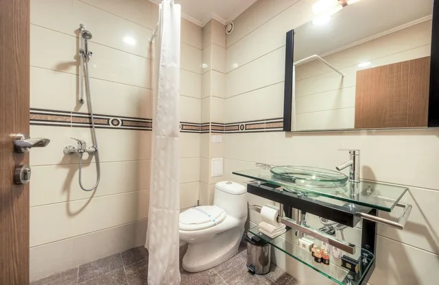 غرفة بسريرين منفصلين مع أريكة، MPM Family Hotel Merryan 3/3