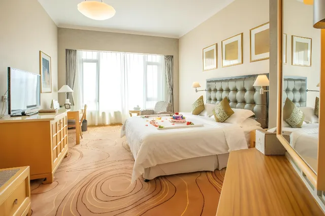 غرفة تنفيذية بسرير كينج، Shantou Junhua Haiyi Hotel 1/2