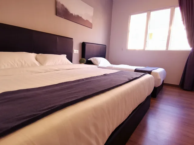 غرفة ديلوكس ثلاثية بسرير كينج وسرير فردي، The Core Hotel 1/4