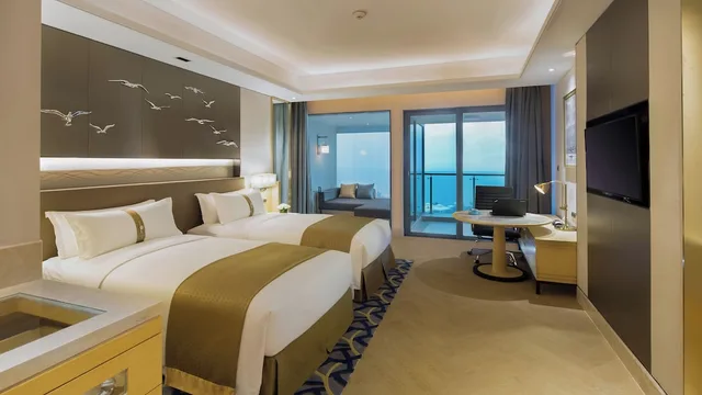 غرفة بريميوم بسرير فردي، Holiday Inn Haikou West Coast 2/3