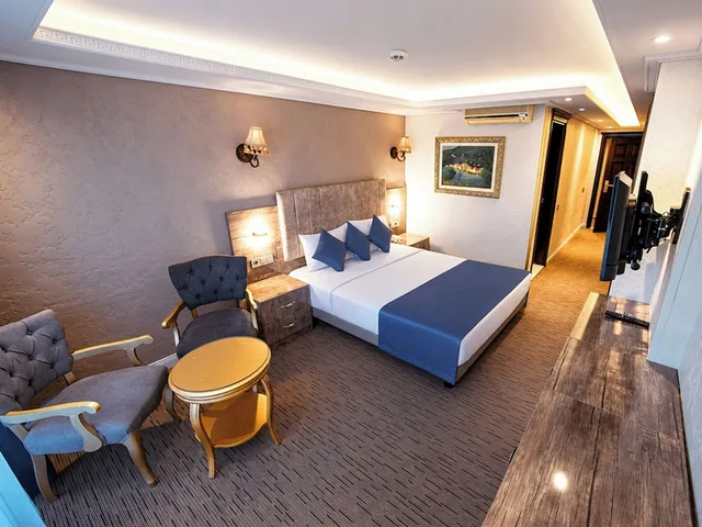 غرفة جونيور بسرير كينج بإطلالة على الحديقة بشرفة، Hotel Aslan Istanbul 1/4