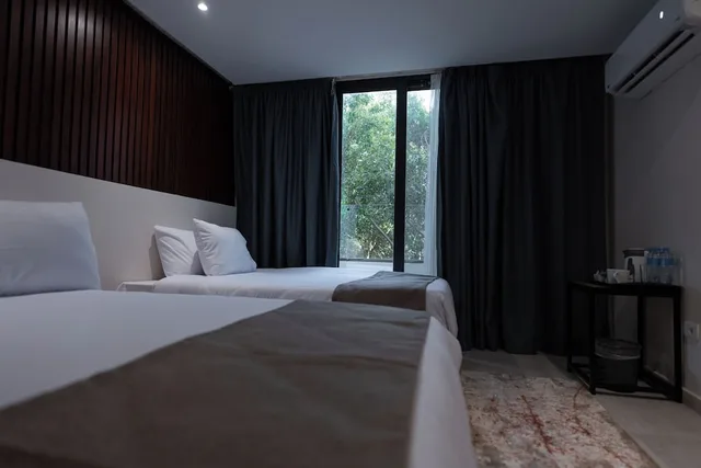 غرفة عائلية بسرير كوين وسرير فردي، Pyramid Front Hotel 1/3