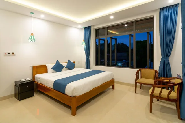 غرفة ديلوكس بسرير مزدوج أو سريرين منفصلين بشرفة، An Bang Scent Beach Homestay 2/10