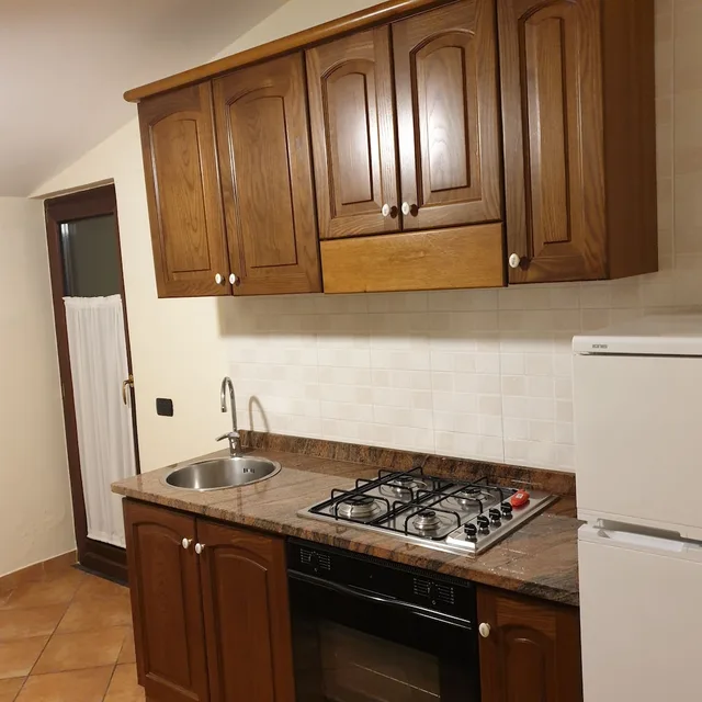شقة ديلوكس بسرير كينج وسرير كوين بإطلالة على البحر بشرفة بغرفتي نوم مع أريكة، RESIDENCE L INCANTO 9/9