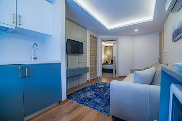 شقة تقليدية بسرير كينج مع أريكة، Comfort Beige Hotel 6/8