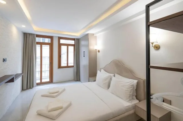 شقة عائلية بسرير كوين وسرير فردي مع أريكة، Arach Hotel Harbiye 2/5