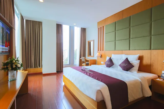 جناح عائلي بسرير مزدوج وسرير فردي بإطلالة على المدينة، Edenstar Saigon Hotel 3/9