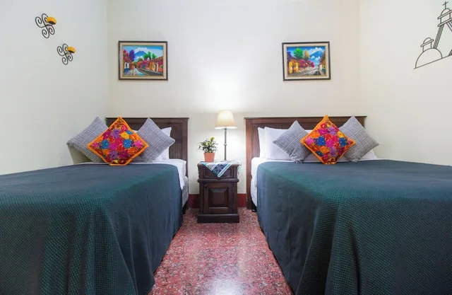 غرفة أساسية بسرير مزدوج وسرير فردي، Hostal Antigua - Hostel 3/5
