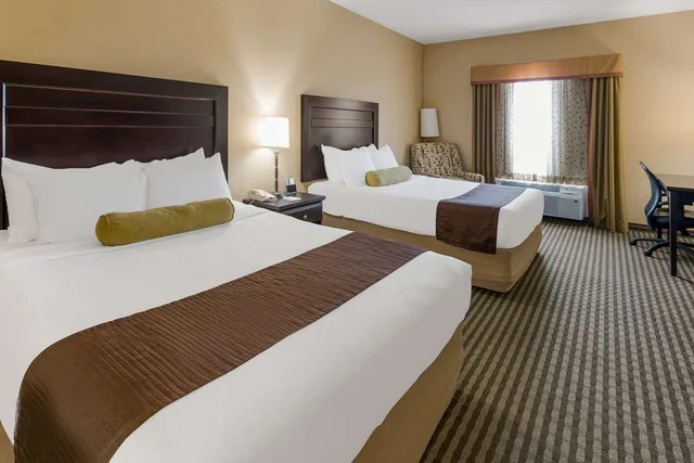 غرفة بسريرين كوين يُسمح فيها بالحيوانات الأليفة، Best Western Sunrise Inn and Suites 3/4