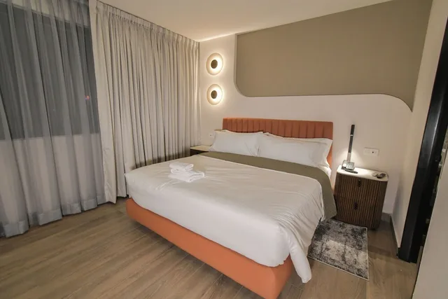 غرفة قياسية بسرير كوين، Expo Satelite Hotel and Suites 1/7