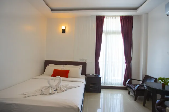 غرفة ديلوكس بسرير كوين، KING GRAND BOUTIQUE HOTEL 1/10