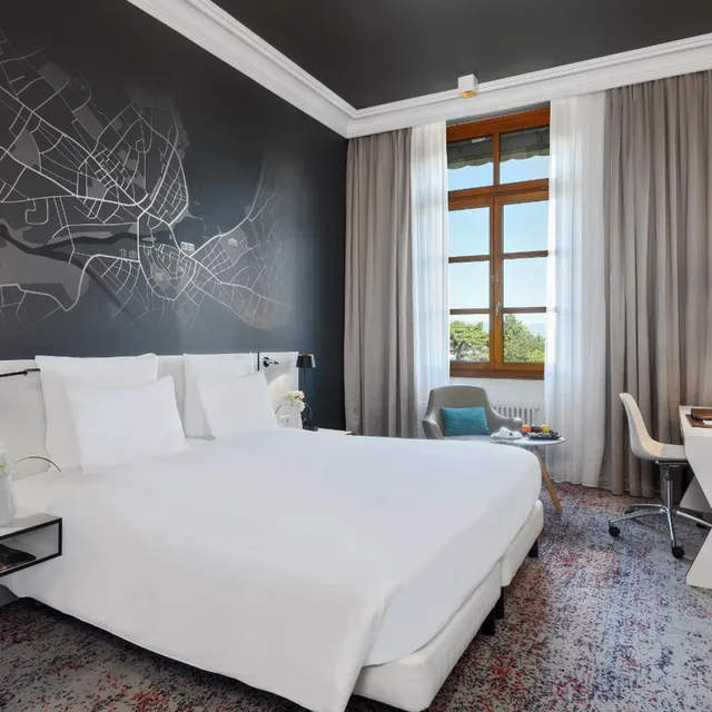 غرفة ديلوكس بسرير كينج بإطلالة على الحديقة، Hotel Metropole Geneve 2/8