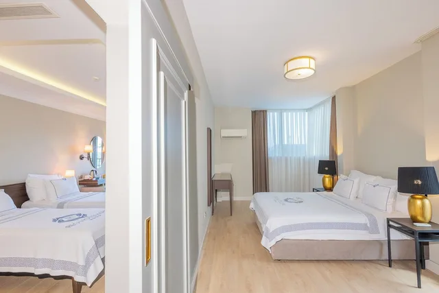 غرفة عائلية رباعية بسرير مزدوج وسريرين منفصلين، REO Hotel & Spa 3/7