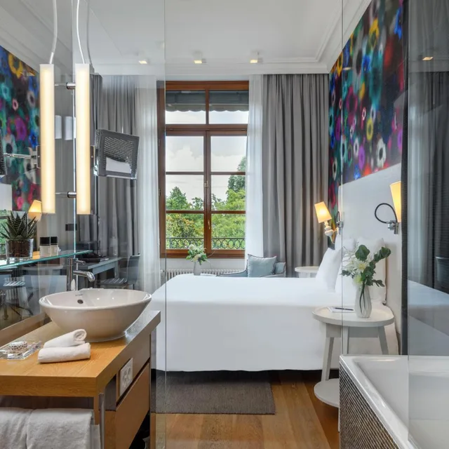 غرفة ديلوكس بسرير كينج بإطلالة على الحديقة، Hotel Metropole Geneve 6/8
