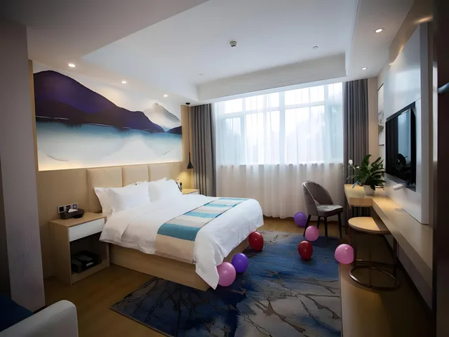 غرفة ديلوكس بسرير كينج وسرير كوين، VX Heze Dingtao District Taoyi Road Hotel 1/2