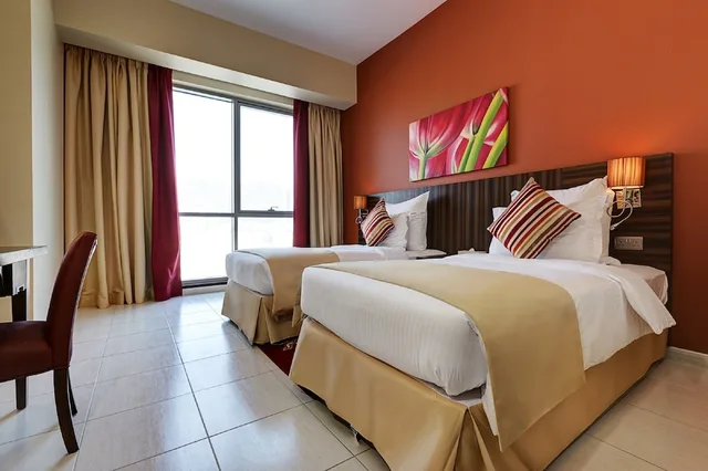 جناح رئاسي بسريرين كينج وسرير فردي، Abidos Hotel Apartments Dubailand 3/6
