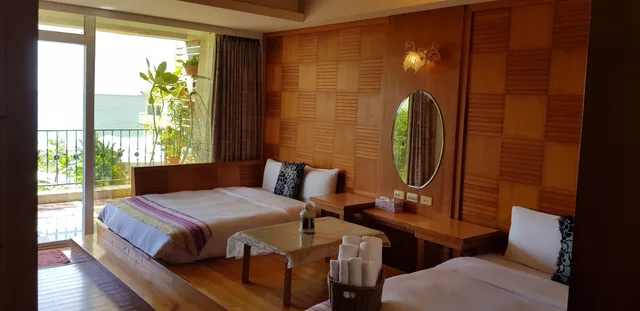 غرفة قياسية رباعية بسريرين مزدوجين بإطلالة على البحر، Ming-Jun Holiday Inn 4/10