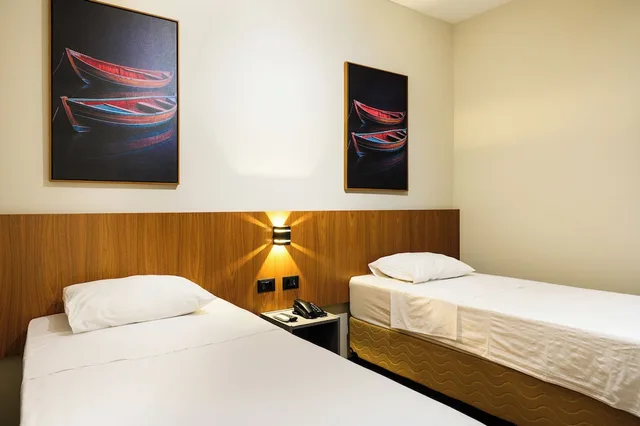 غرفة ديلوكس مفردة بسريرين منفصلين مع أريكة، Slaviero Hotel Londrina Flat 4/10