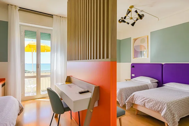 غرفة بانورامية رباعية بسرير مزدوج وسرير بطابقين بإطلالة على البحر، Il Nido Hotel 1/10