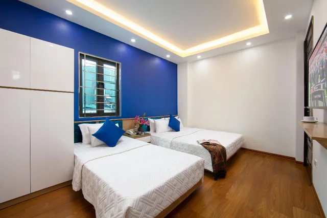 غرفة سوبيريور ثلاثية بسرير كوين وسرير فردي، Hanoi Golden Hotel 2/2