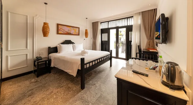 غرفة ديلوكس بسرير كينج بإطلالة على النهر، Hoi An Coco River Resort Spa 4/9