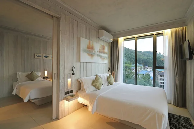 2 Bedrooms, Suite, King and Twin Beds, Corner, Dinso Resort 1/7