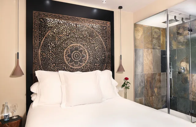 دوبلكس بسرير كوين مع أريكة، Gran Derby Suite Hotel 1/3