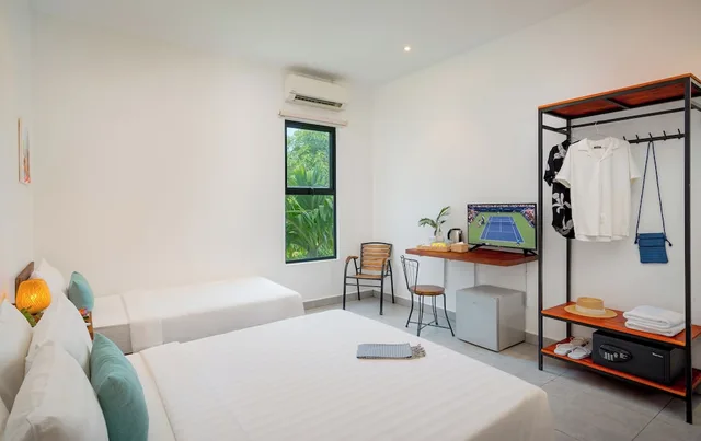 غرفة ديلوكس ثلاثية بسرير كوين وسرير فردي، Onederz Hostel Siem Reap 3/5