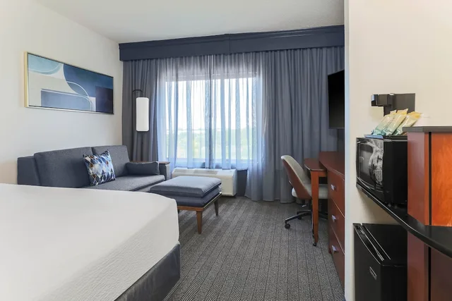 Room, King Bed, Sofa, Large, Accessible, Courtyard Austin Airport 1/4