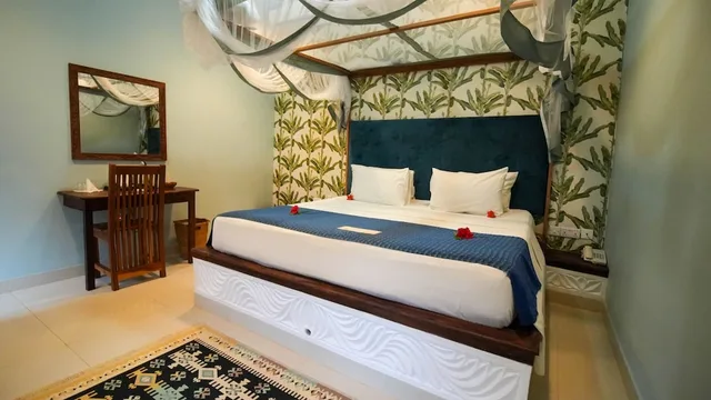 غرفة ديلوكس بسرير كينج، Kendwa Rocks Beach Hotel 1/4