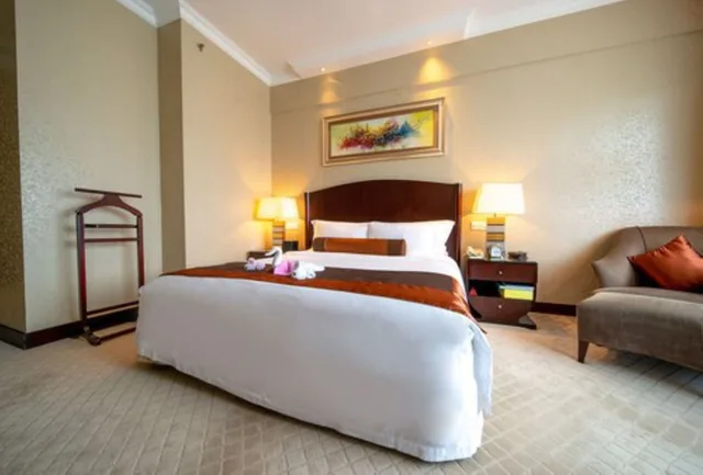 Deluxe King Size Bed Room H، GRAND INTERNATIONAL HOTEL 3/10